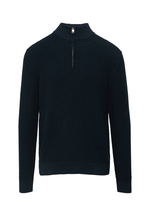 Pull en maille texturée bleu marine avec manches longues, poignets et ourlet côtelés, et une courte fermeture éclair à l'avant sur un col montant.