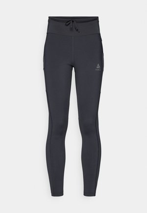 Dark gray leggings with a high waistband, drawstring closure, and side pockets. Made from stretchy material with subtle branding.