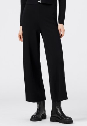 Spodnie materiałowe