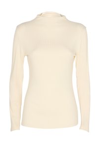 Maglietta a maniche lunghe di colore crema con un collo alto e una silhouette aderente, presentata su uno sfondo bianco.