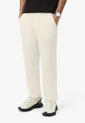 Pantalones deportivos - beige