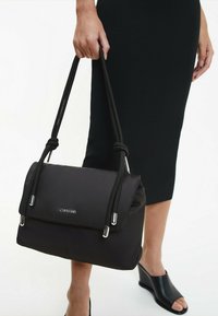 Calvin Klein Sac à main - ck black