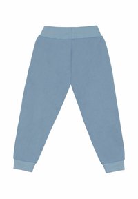 Lichtblauwe sweatpants van zacht materiaal, met een geribbelde elastische tailleband en manchetten, in een relaxte pasvorm en zonder zichtbare patronen.
