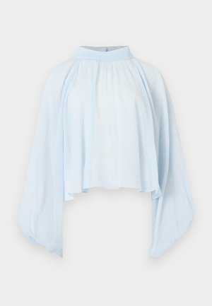 Ανοιχτό γαλάζιο μπλούζα με μακριά μανίκια, ψηλό λαιμό, ελεύθερη εφαρμογή και φουσκωτά μανίκια που συγκεντρώνονται στους καρπούς.