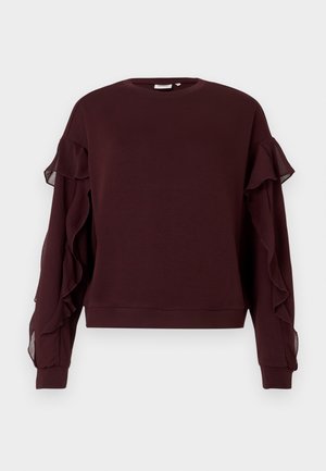 Dark burgundy long-sleeve sweatshirt with sheer ruffle detailing along the sleeves and ribbed cuffs and hem.