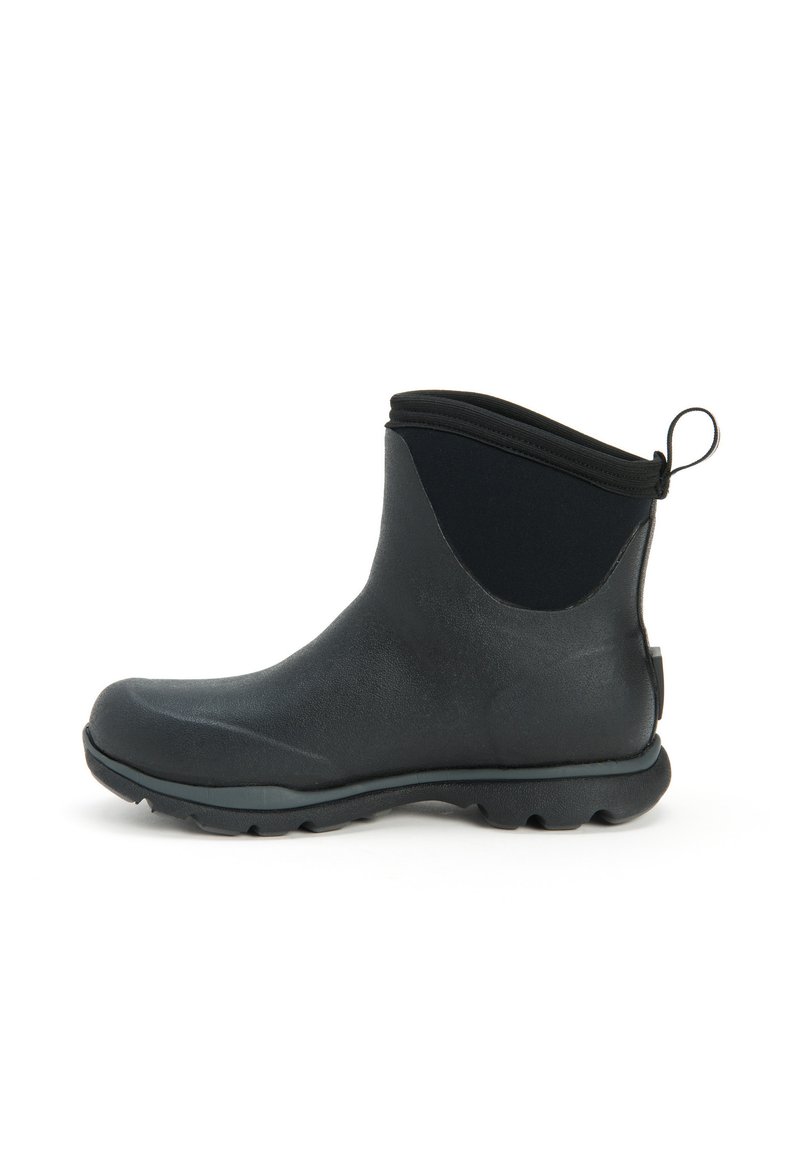 Black ankle-height waterproof boot with a smooth rubber exterior, textured black neoprene panel, and a pull tab at the back for easy wear.