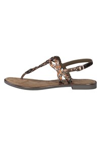 Sandalo in bronzo intrecciato con suola piatta, caratterizzato da un design con fascetta per le dita, cinturino alla caviglia regolabile e una soletta morbida simile alla pelle scamosciata.