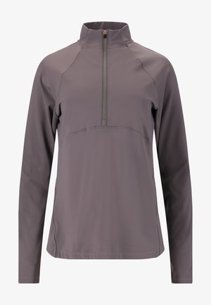 Gray long-sleeve pullover with a quarter zipper, made of soft fabric; features raglan sleeves and a subtle stitched accent across the front.