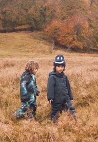 Molo PINGO JUNIOR SNOWSUIT - Žieminis kombinezonas - dark blue/green
