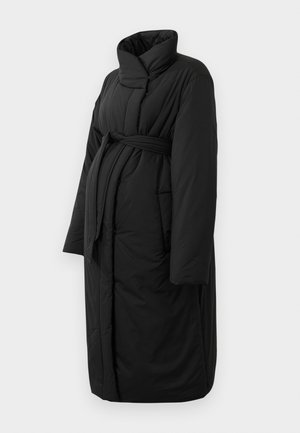 Must musta ülikond kõrge kraega, pikad varrukad ja vöökoht. Omab õmblustekstuuriga ja keskmise pikkusega lõiget.