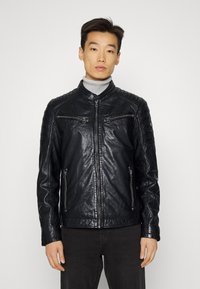 Gipsy by Mauritius CHESTO - Casaco de couro - black