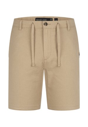 Beige shorts med snoretræk i taljen, knaplukning, glat tekstur og sidelommer. Mærkets label synlig indeni taljebåndet.