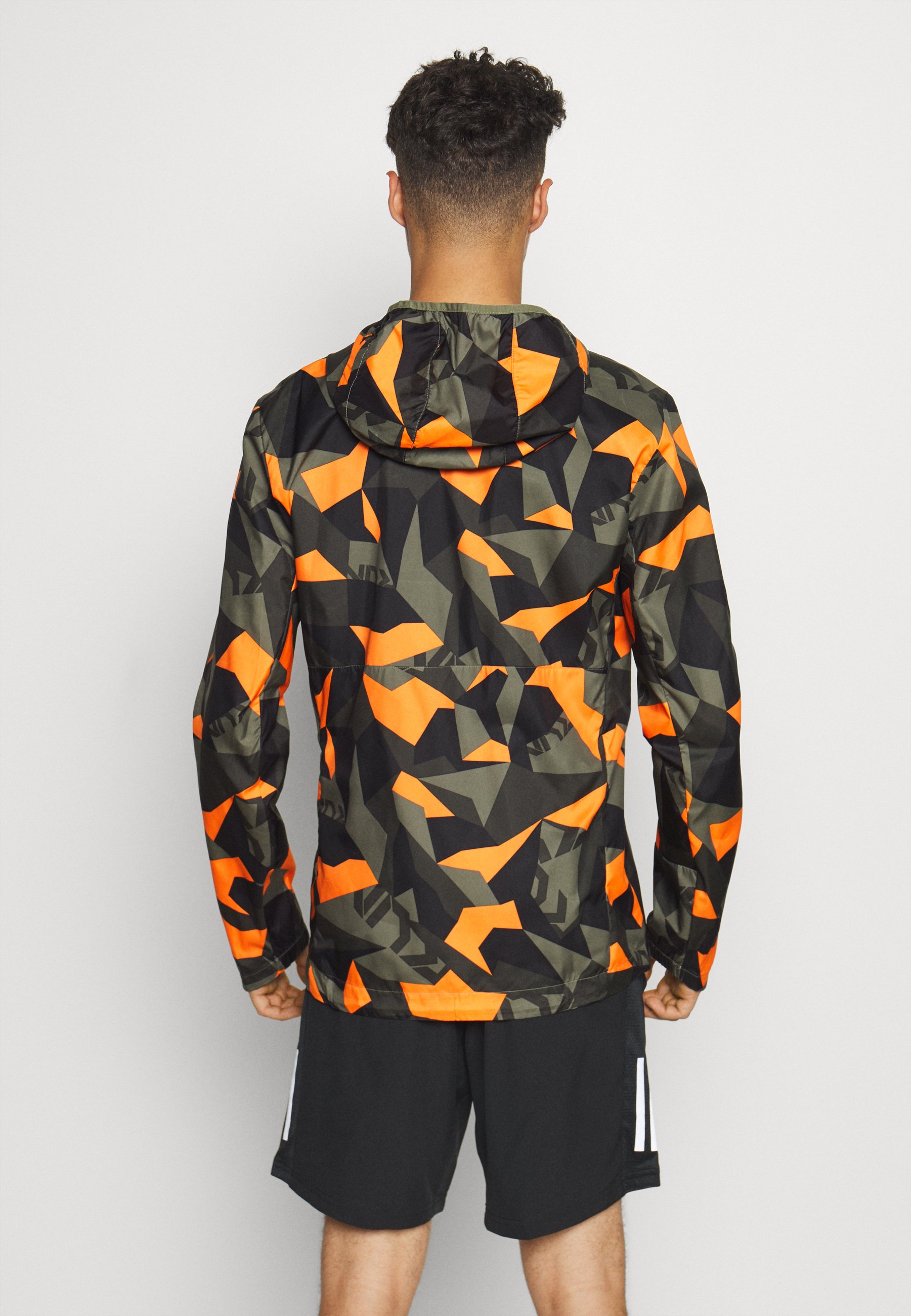 OWN THE RUN Laufjacke legacy greepp signal orangeblack OWN THE RUN Laufjacke legacy greepp signal orangeblack
