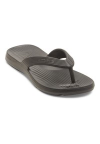 Sandales en caoutchouc noir avec une semelle texturée, des brides en forme de V et un logo Quiksilver sur le lit de pied.