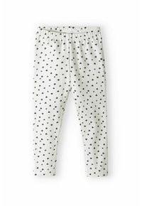 Hvide leggings med et mønster af sorte hjerter, der har en elastisk talje og en glat, blød tekstur. Tætsiddende design uden synligt hardware.