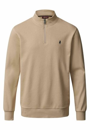 Beżowa bluza z miękkiego materiału z półzamkiem, długimi rękawami, ściągaczami przy mankietach i małym, ciemnym logo na piersi.