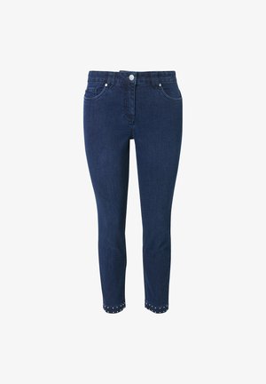 Donkerblauwe denim jeans met een slanke pasvorm, vijf zakken, zilveren hardware en studs aan de zoom.