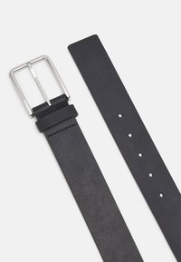 Calvin Klein WARMTH - Riem - black