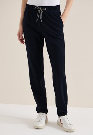 IN UNI - Pantalon de survêtement - blau