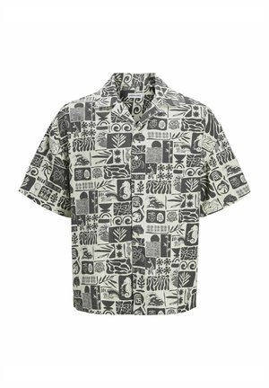 Korte mouw blouse in licht crèmekleur met een grafisch zwart-wit patroon van verschillende vormen en texturen. Voorzien van een kraag en een comfortabele, losse pasvorm.