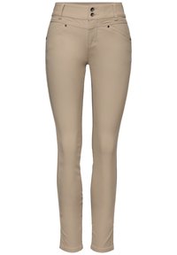 Pantalones skinny beige de tela suave, con una cintura alta, dos botones y bolsillos frontales con detalles de costura sutiles.