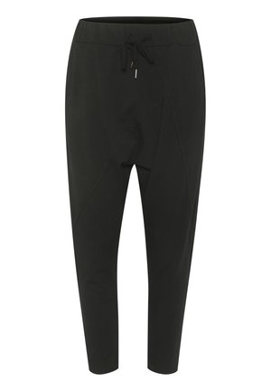 Pantalones deportivos negros hechos de una tela suave, con una cintura elástica ajustable, piernas cónicas y un diseño de costura asimétrica.