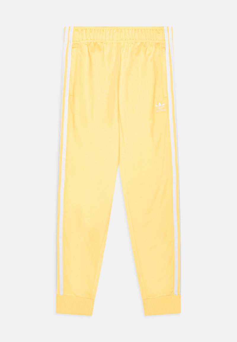 adidas Originals SUPERSTAR - Teplákové kalhoty - spark