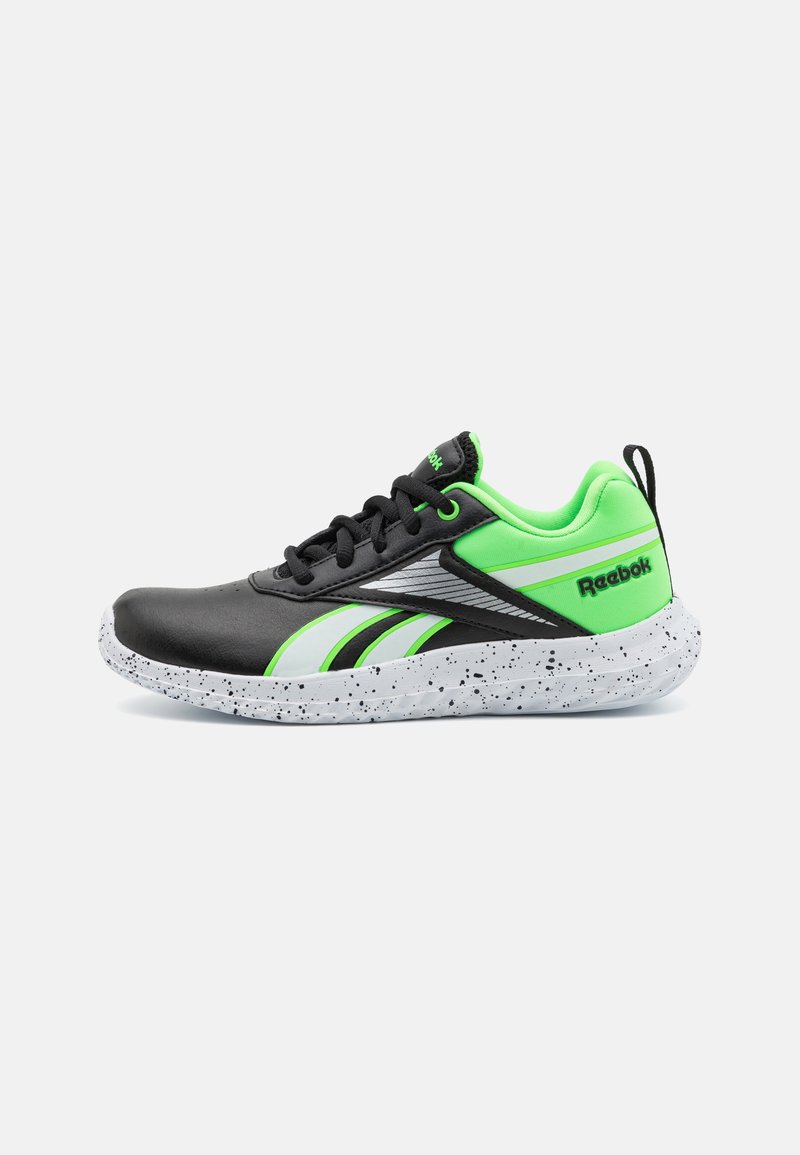 Black and neon green athletic shoe with a smooth leather upper, white speckled sole, and Reebok logo. Features curved design and mesh accents.