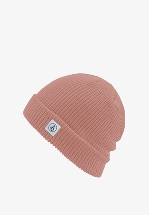 Pink beanie hat with ribbed texture, folded cuff, and a white label featuring a logo, offering a snug fit for warmth.