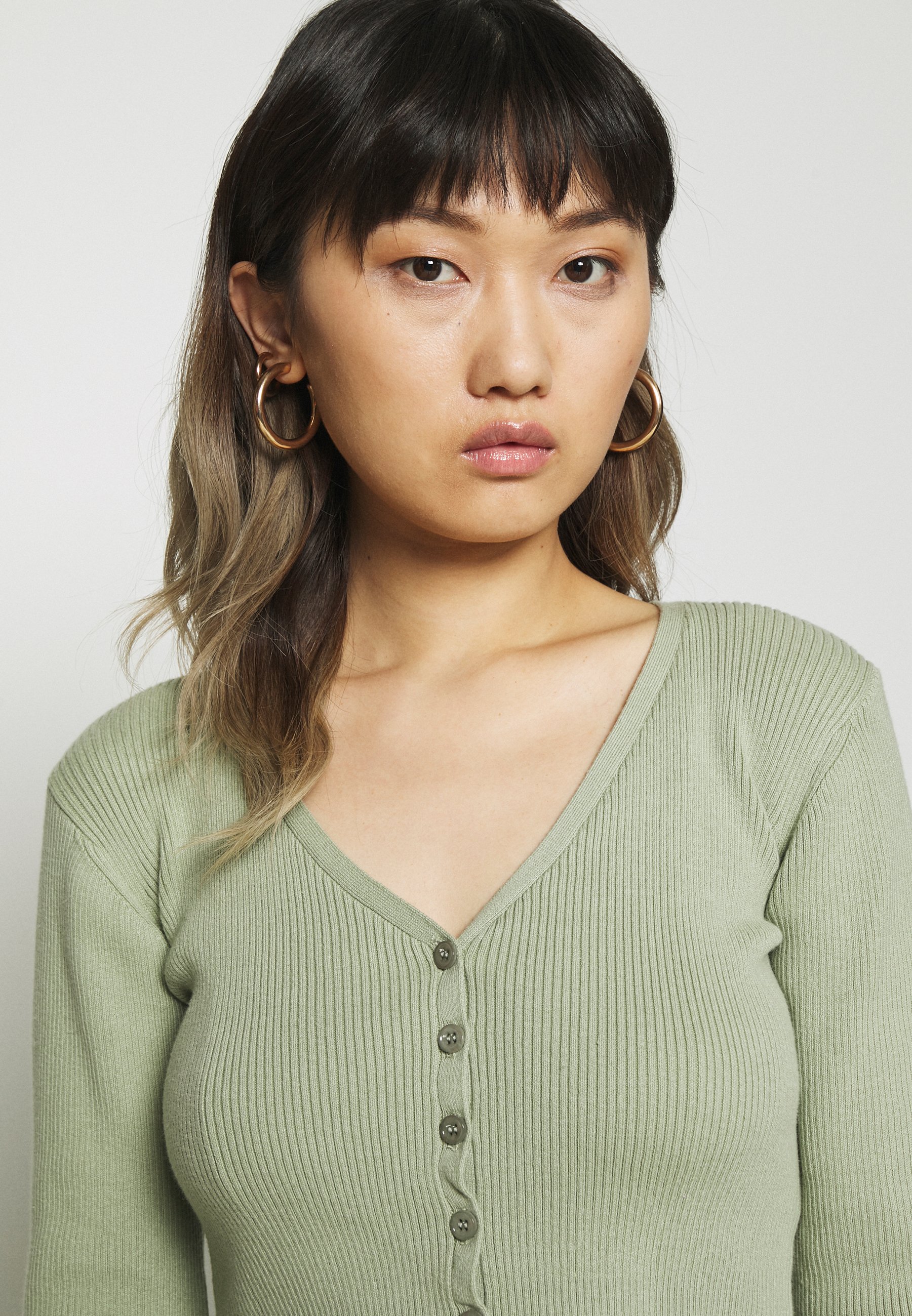 light green cropped cardigan