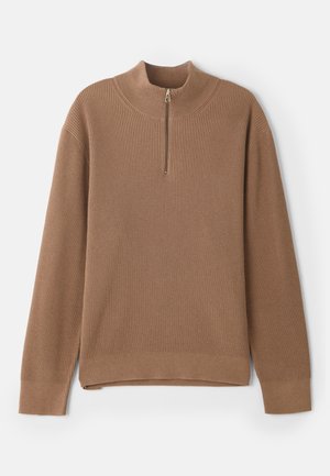 Brown ribbed pullover with a high collar and half-zip closure. Features long sleeves and a straight hem with side slits for ease of movement.