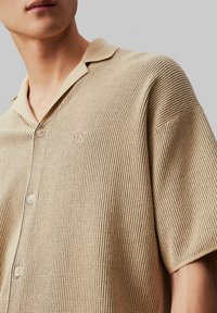 Calvin Klein Jeans Kardiganas - pale khaki
