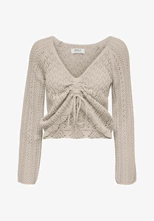 Beige cropped sweater with long sleeves, V-neck, textured knit pattern, and drawstring detail in the center.