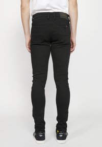 Koroshi Oprijete (skinny) kavbojke - denim black denim