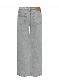 Jeans de pierna ancha de un gris claro en tejido de denim que presentan una cintura alta, cinco bolsillos y un parche de cuero con el logo en la parte posterior de la cinturilla.