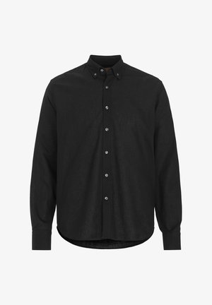 Zwarte blouse met lange mouwen, gemaakt van gestructureerde stof, met een puntige kraag en een gerafelde manchet met knopen. Afgeronde zoom met een ontspannen pasvorm.