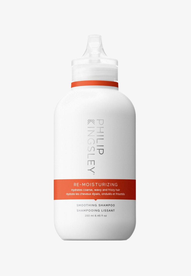 White bottle with a rounded shape and a transparent cap. Features an orange label stating "Re-Moisturizing Smoothing Shampoo," 250 ml size.