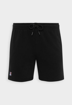 Black cotton shorts with an elastic waistband, front drawstring, and a small logo on the left leg. Smooth texture, casual fit.