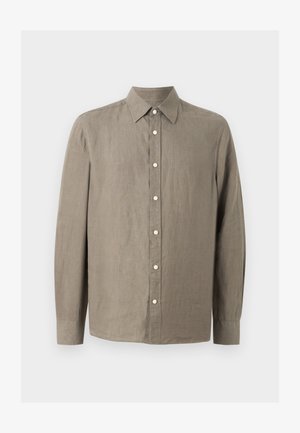 Long-sleeve, light brown button-up shirt with pointed collar and white buttons, made from textured linen fabric.