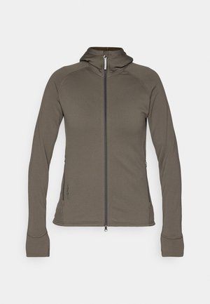 Hooded jacket in olive green with a full zipper, fitted design, soft texture, flatlock seams, and zippered side pockets.
