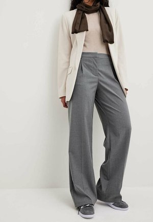 Halflange jas - beige
