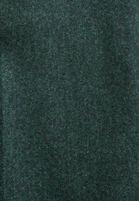 Dark green fabric with a textured, woven appearance, featuring subtle variations in shade and a soft, slightly fuzzy surface.
