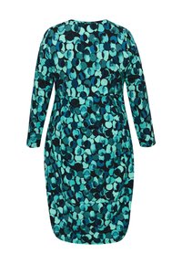 Dlhé šaty s modro-tealovým krúžkovým vzorom na čiernom pozadí, vyrobené z mäkkého materiálu s voľným strihom a zaobleným výstrihom.