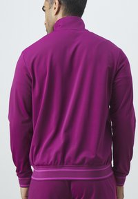 Nike Performance HERITAGE - Chaqueta de entrenamiento - sangria/picante red