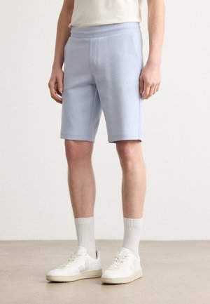 Calvin Klein MICRO LOGO REPREVE - Tracksuit bottoms - zen blue