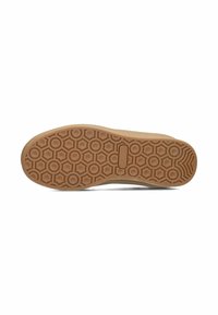 Suola di scarpa in gomma marrone con un motivo esagonale e accenti circolari. Bordo liscio con un profilo piatto. Sezione superiore di colore chiaro visibile.