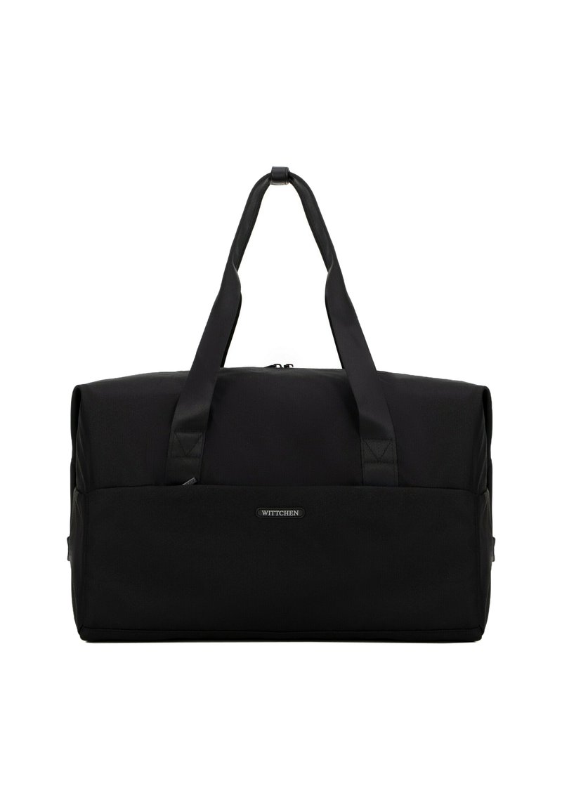 Sac de sport noir en matériau durable, avec des poignées supérieures robustes et une fermeture éclair. Design simple avec un accent logo à l'avant.