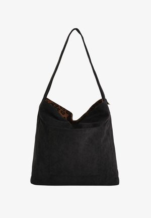 Black suede hobo bag with a large front pocket, V-shaped top, and a leopard print lining visible at the opening. Features a long shoulder strap.