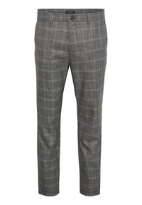 Šedé kárované kalhoty z lehké látky. Mají hladký přední díl, zapínání na knoflík a jemnou texturu s kontrastními liniemi.