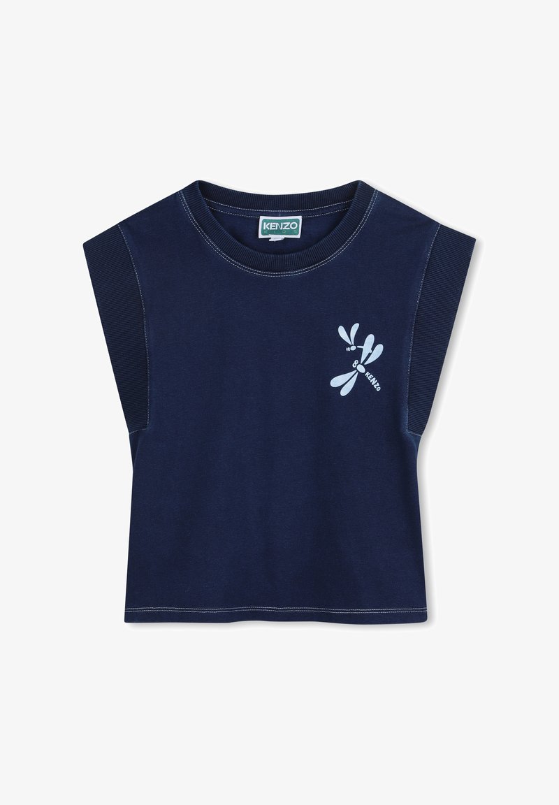 Haut en coton bleu marine à manches courtes avec un col rond, présentant un motif graphique bleu et un tissu contrastant sur les épaules.